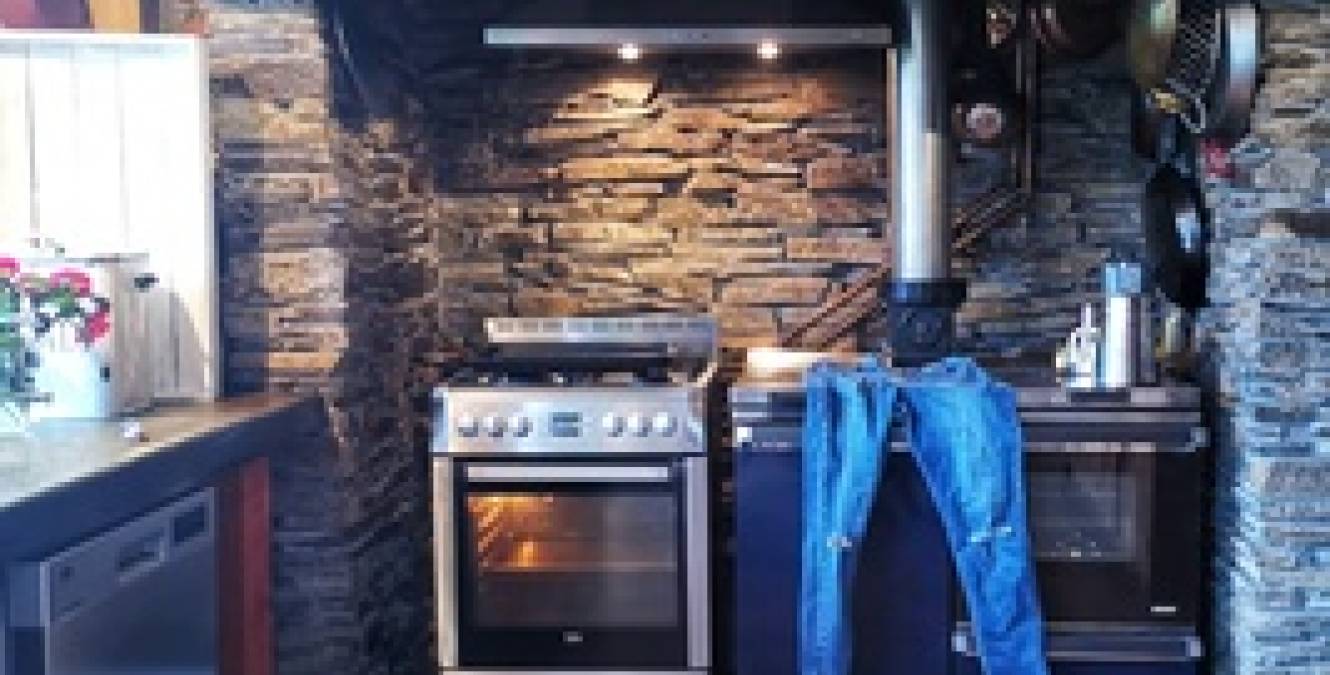 inglenook fireplace, plank flooring character kitchen